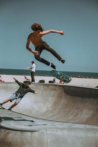 iphone wallpapers two men skateboarding on bowl ramp iphone backgrounds